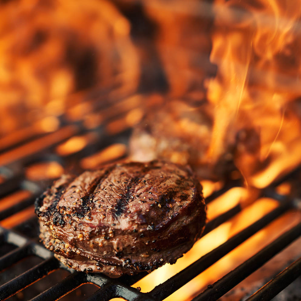 Grilling with Steaks on Bbq Grill